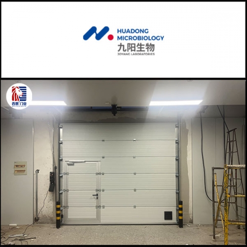 江苏九阳生物制药仓库安装保温提升门
