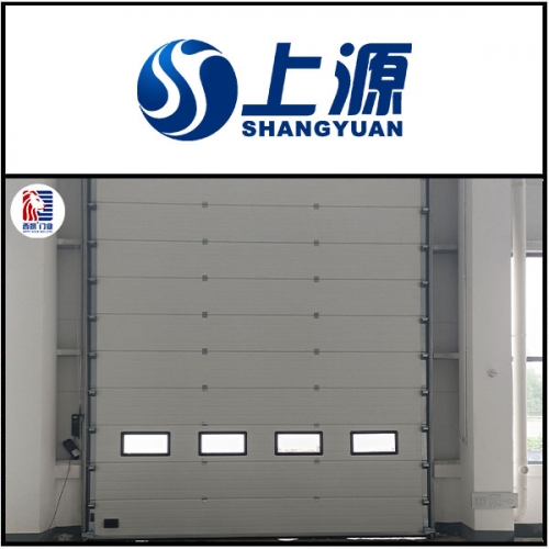 上海上源泵业制造有限公司车间安装提升门