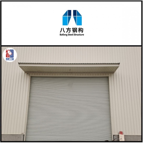 江苏八方钢结构集团有限公司车间安装了抗风提升门
